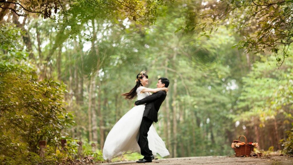 A married couple photographed in the forest